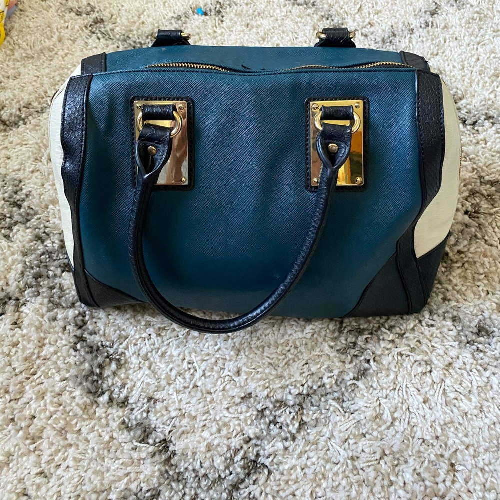 Lightly Used Satchel with Cheetah Print Inside